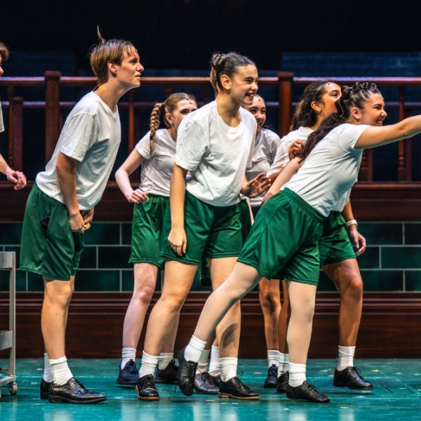 Pictured: The Company of MATILDA THE MUSICAL. Directed by: Megan Watson. Music Directed by: Sarah Richardson. Choreographed by: Stephen Cota. Set Design by: Scott Penner. Costume Design by: Lisa Wright. Lighting Design by: Jareth Li. Sound Design by: Aaron Ouellette. Photo by Dahlia Katz.