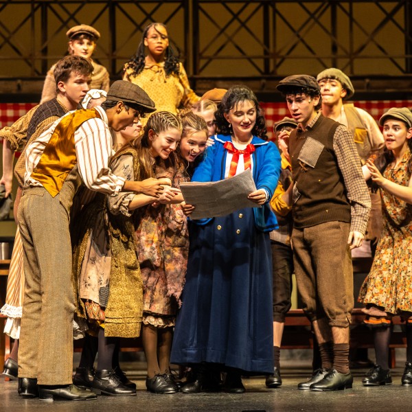 Pictured: Company members of Disney’s NEWSIES at the Grand Theatre. Directed by Ray Hogg. Music Direction by Matthew Atkins. Choreographed by Krista Leis. Set Design Consultant: Joshua Quinlan. Costume Design by Lisa Wright. Lighting Design by Echo Zhou周芷會. Sound Design by Emily Porter. Fight Director: Mike Dufays. Disability Consultant: Kristi Hansen. Stage Management by Melissa Cameron. Photography by Dahlia Katz.