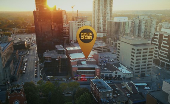 A birds-eye view of a portion of Richmond Street, centred on the Grand Theatre.