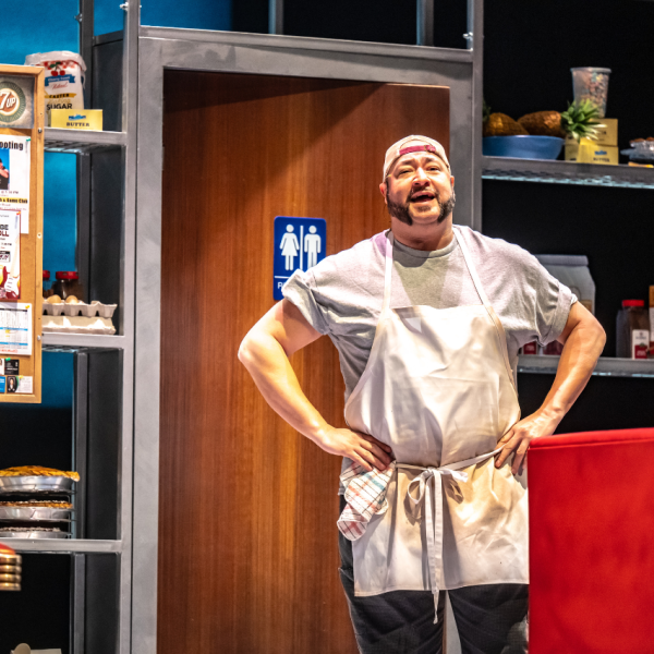 Pictured: Lee Siegel. Director: Rachel Peake. Music Director: Patrick Bowman. Choreographer: Genny Sermonia. Set & Costume Designer: Scott Penner. Lighting Designer: Michelle Ramsay. Sound Designer: Richard Feren. Fight & Intimacy Director: Siobhan Richardson. Photo by Dahlia Katz.