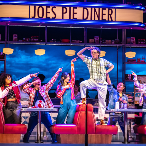 Pictured: THE COMPANY OF WAITRESS. Director: Rachel Peake. Music Director: Patrick Bowman. Choreographer: Genny Sermonia. Set & Costume Designer: Scott Penner. Lighting Designer: Michelle Ramsay. Sound Designer: Richard Feren. Fight & Intimacy Director: Siobhan Richardson. Photo by Dahlia Katz.